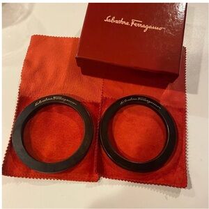 Salvatore Ferragamo Vintage Wooden Bangle Bracelets in a suede pouch.